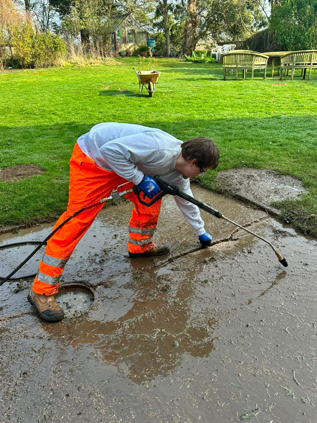 Cleaning a muddy slab area
