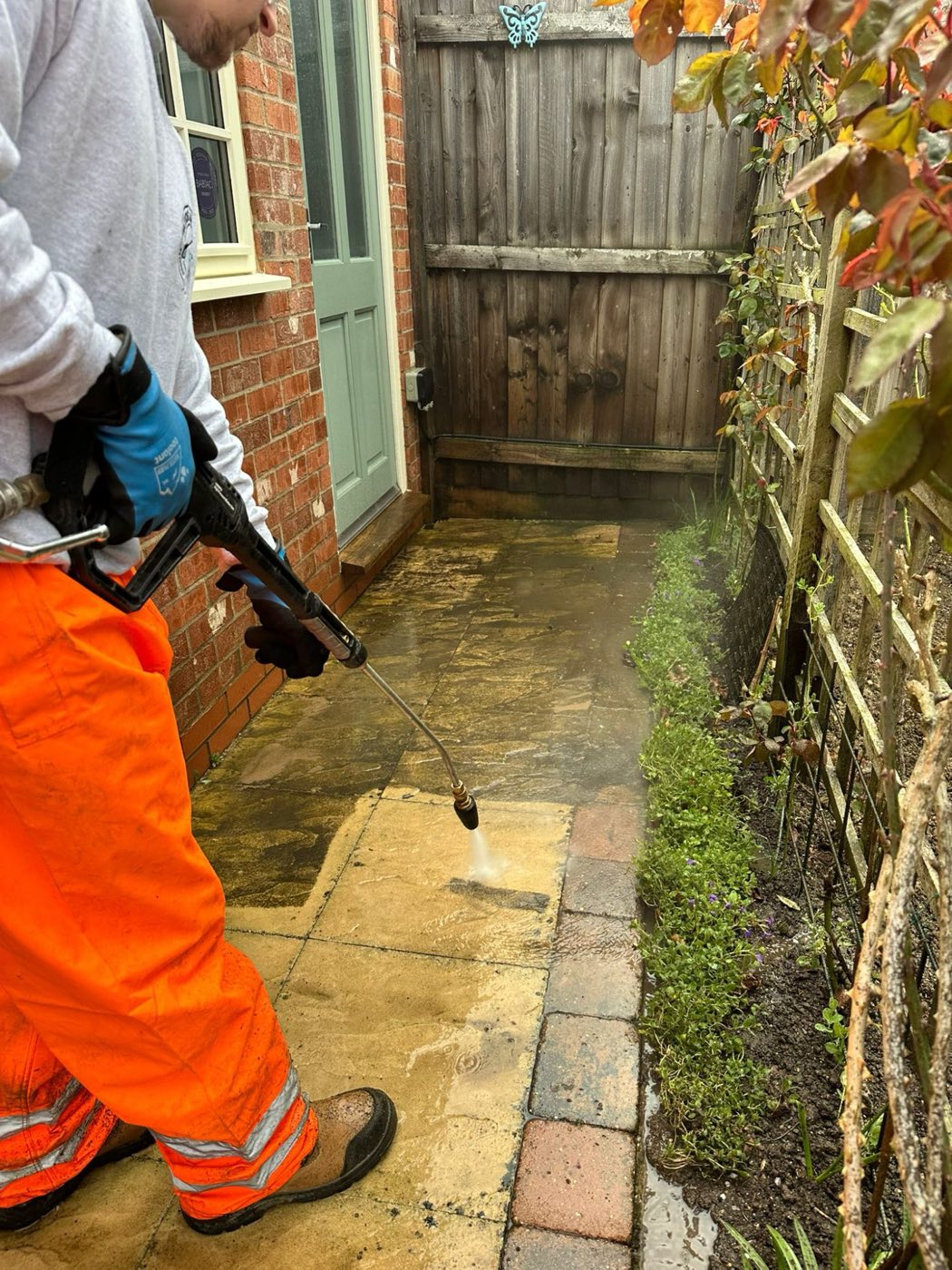 Pressure washing a walkway