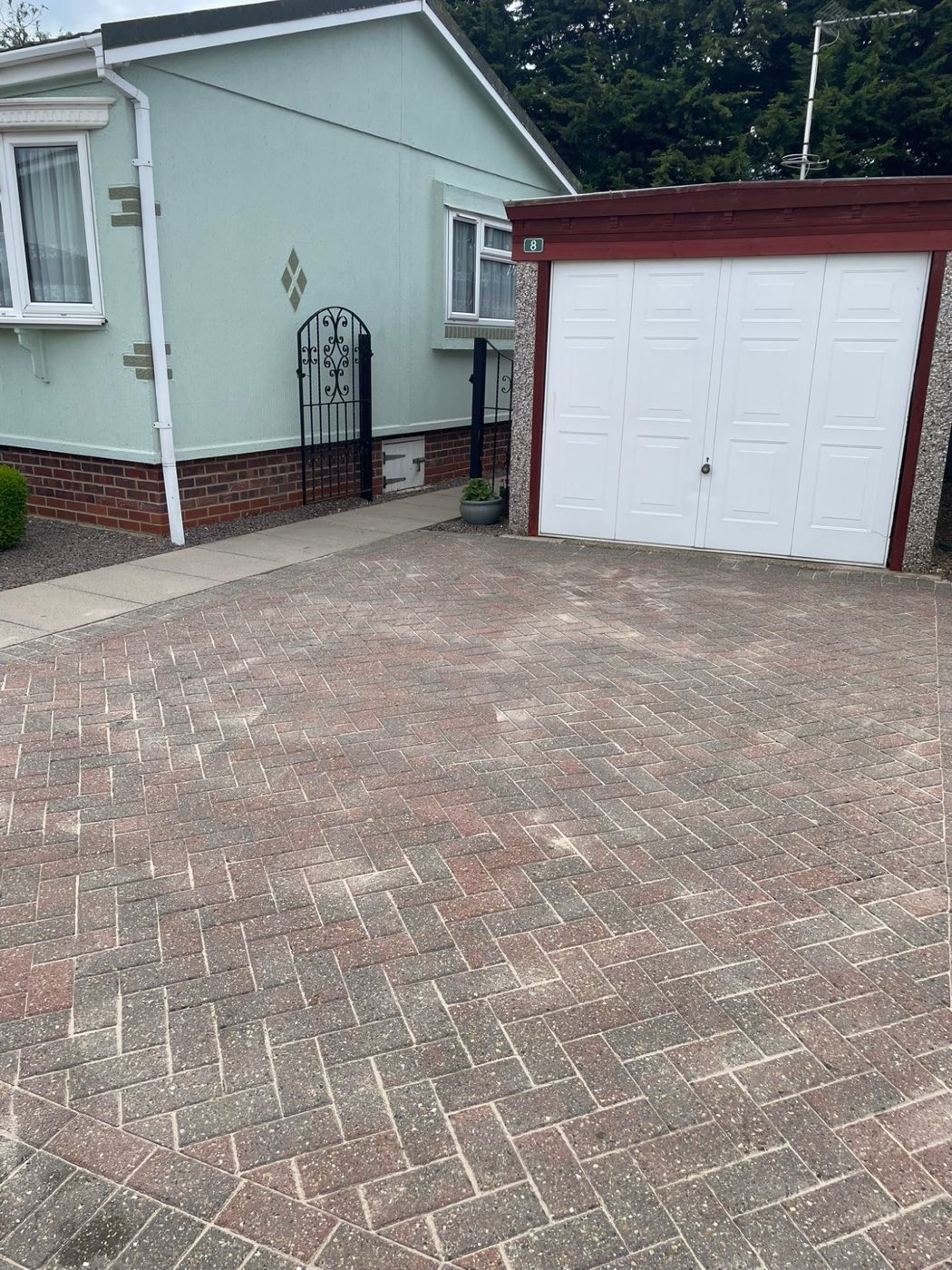 Freshly cleaned block-paved driveway