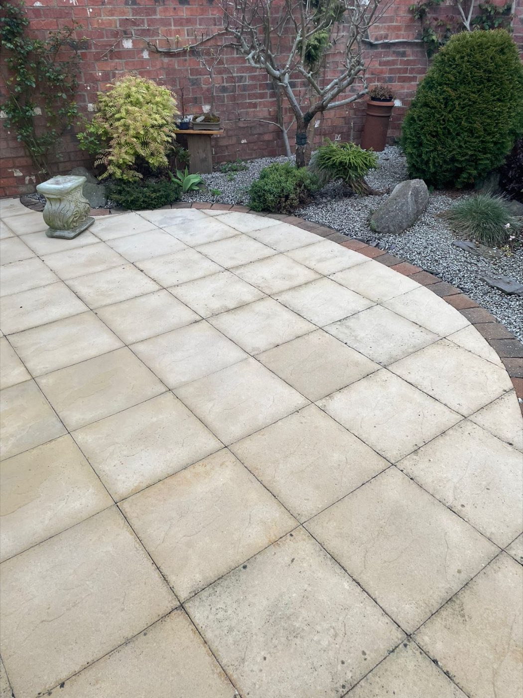 Restored outdoor area with raised beds